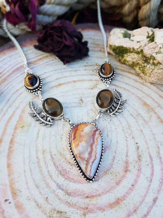 Statement necklace with natural jasper and tiger eye gemstones. The necklace has 3 tiger eye gemstones and one big jasper gemstones
